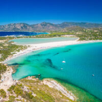 aerial-view-of-porto-giunco-beach-and-tower-in-vil-2025-01-16-13-10-26-utc (1)